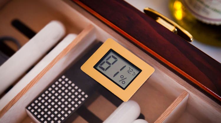 cigar advisor how to lower humidity in a cigar humidor - hygrometer reading 81% (too high)
